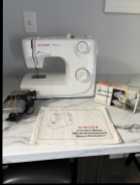 Singer Sewing Machine - Photo 1 of 2