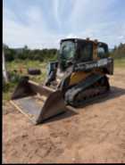 Skid steer - Photo 1 of 4