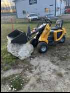 Snow clearing loader