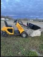 Snow clearing loader - Photo 1 of 5