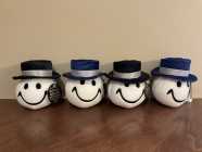 Xmas decorations. Snowball Faces with a black hat in ...