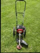 Southland Weed Trimmer on wheels