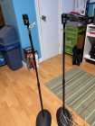 Four (4) metal speaker stands. Adjustable heights. ...