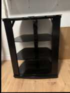 Black tempered glass corner tv stand  ( 30” h x 24” ...
