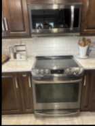 LG stove, seven years old five burner stove, top one ...