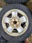 Studded winter tires on rims - Photo 2 of 4