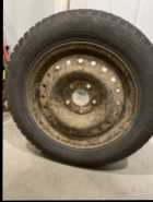 Studded winter tires and steel rims 