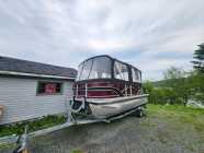  Sylvan tri-hull pontoon boat.