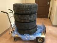 Four studded winter tires on rims. To fit Honda Civic.