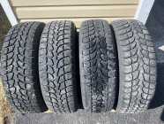 4 winter tires with 13,000 kilometres ...