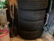 four Firestone winter tires on rims, used one winter.