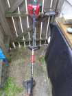 troy-bilt 4 cycle weed trimmer, add gas no oil - Photo 1 of 4