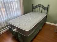 Twin bed complete w/headboard, sheets