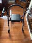 Walker with a seat  - Photo 1 of 3
