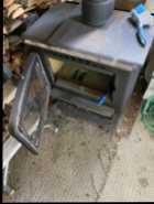 Woodstove for sale with chimney in excellent condi - Photo 4 of 7